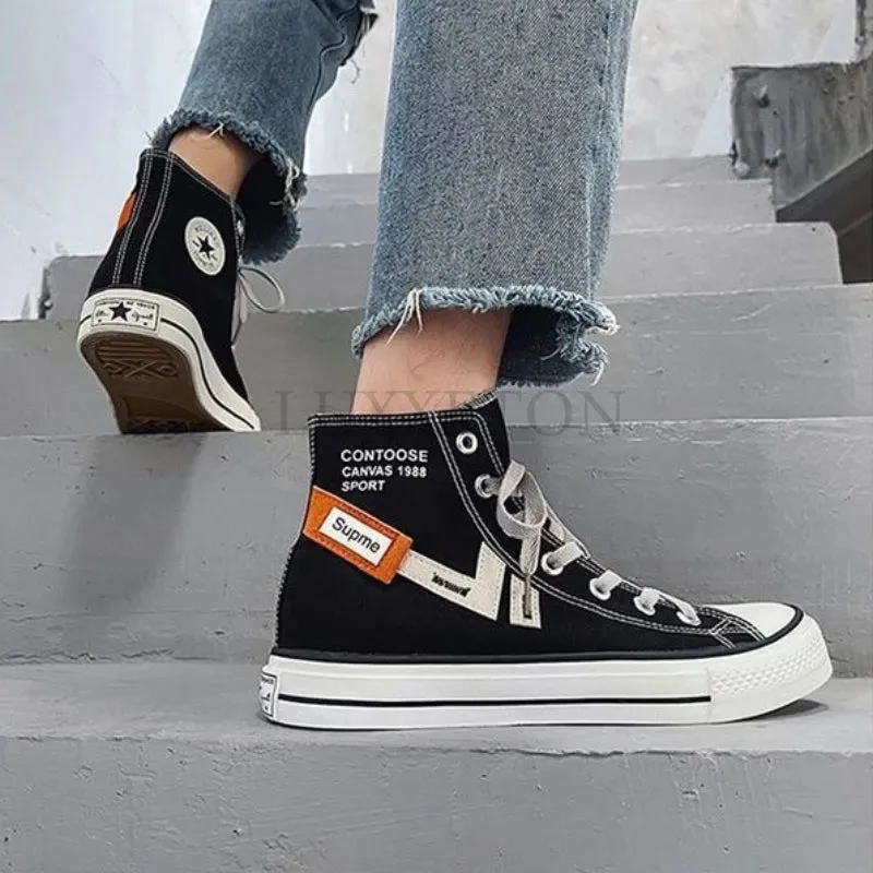 Emo-Skateschuhe für dich schwarz und orang